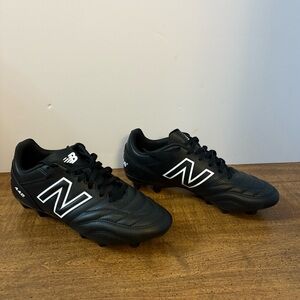 New Balance 442 men 6.5 women 8 Black Leather Cleats NEW